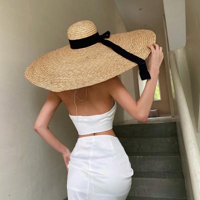 China Lady Raffia Sun Hat Striped Straw Beach Hat Natural Grass Flat Surface Around Summer Sun Tassel Leghorn Panama Hats for sale