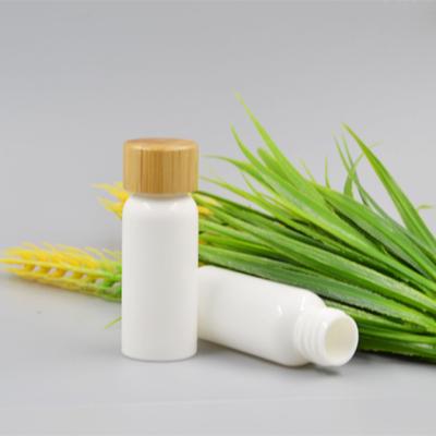 China 100% Compostable Eco-friendly Customized Recycable Essential Oil Bottle With Bamboo Lid Cosmetic Packaging for sale