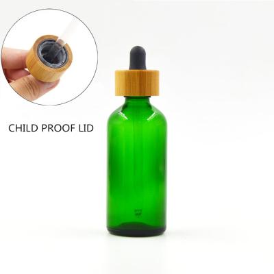 China Personal Care Child Safety Eco-Friendly Bamboo Lid Essential Oil Glass Bottle With Dropper for sale