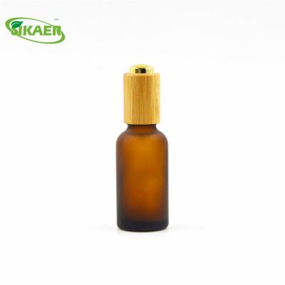 China Customized Personal Care Made Essential Oil Bamboo Olive Bottle With Sweet Glass Dropper Packaging for sale