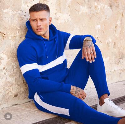 China Anti-Static Fashion Blue Hooded Mens Sports Jogging Suit Pullover Sweater 2 Pieces Set For Men Tracksuits for sale