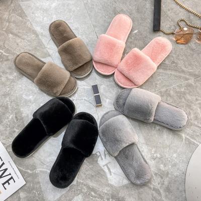 China Interior Designer Women Slides Fuzzy House Slippers New Arrival Fashion Trend Plush Flat Fur Luxury Faux Fur Slippers Bedroom Slippers for sale