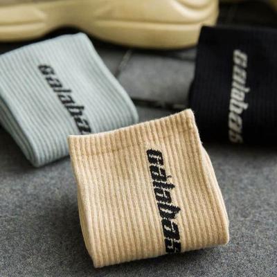 China High Quality Breathable Cotton Fleece Sock Unisex Happy Designer Socks Custom Crew Socks for sale