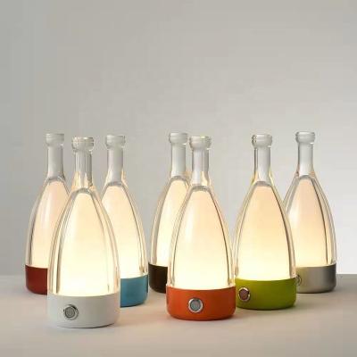 China New modern creative wine bottle table lamp three-color glass touch dimming interior decoration table lamp for sale