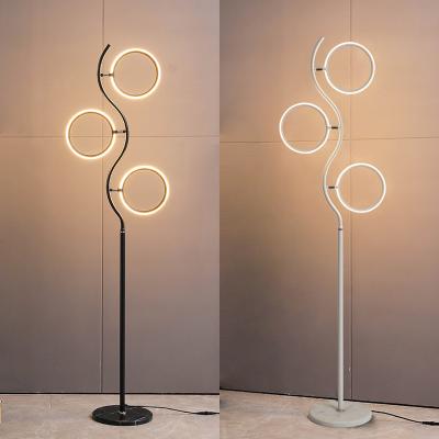 China New Style Minimalist Fashion Floor Lamp Creative Lightweight Circular Light for sale