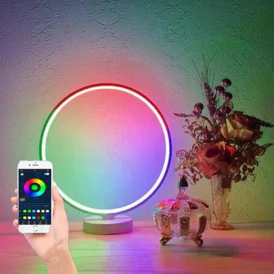 China Modern Minimalist LED Bedroom APP Creative Art Desk Light Round Iron Table Lamp Control Dropshipping for sale