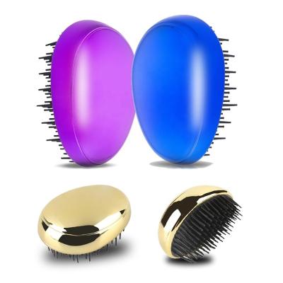 China Plastic Compact Professional Private Label Bling Electrode Paddle Detangling Hair Brush for sale