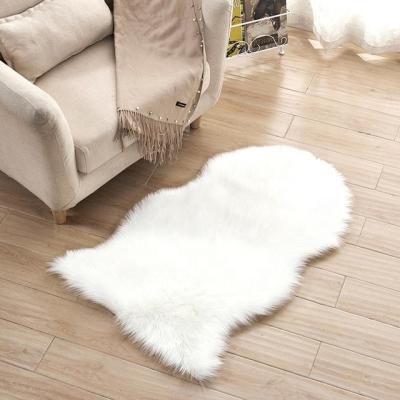 China Luxury washable artificial plush sheepskin faux fur rug for home decor nordic faux fur rug blanket polyester living room rug for sale