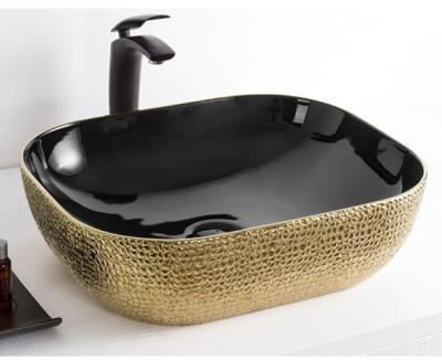 China Hot Selling High Tempreture Ceramic Sliver Diamond Shape Elegant Ceramic Art Basin for sale