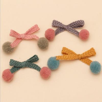 China Hot Wholesale Classic Pom Pom Bow Weave Bow For Girl Accessories for sale