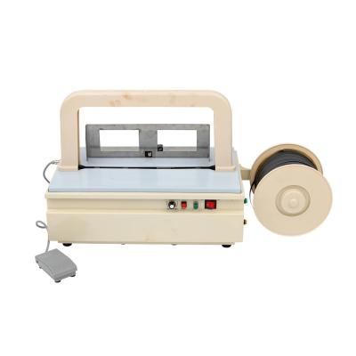 China Electronic Chip Only ZD-08 Mini Power Table Semi Automatic Banknote Strapping Machine Price for sale