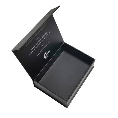 China Book Type Clamshell Recyclable Black Magnetic Gift Box Essential Oil Electronics Packaging Gift Box Rectangular Box for sale