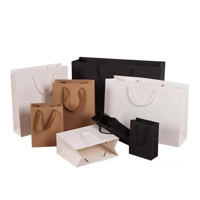 China Recycled Materials Custom Printed Your Own Logo White Brown Kraft Gift Craft Shopping Paper Bag With Handles for sale