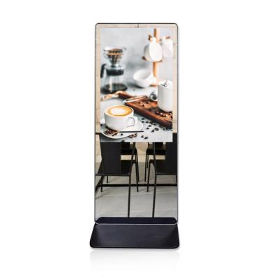 China Android Magic 4k Indoor 65 Inch Mirror Led Advertising Player Floor Stand Digital Signage for sale