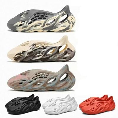 China Breathable comfort the use of EVA foam integrated shoe mold is invincible dimpled sole provides cushioning and traction for the YEEZY foam runner for sale