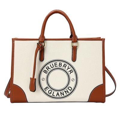 China 100% Eco-friendly Logo Luxury Design Fashion PU Handle Tote Bags Ladies Shoulder Bag Custom Leather Women Handbags Women Handbag. for sale