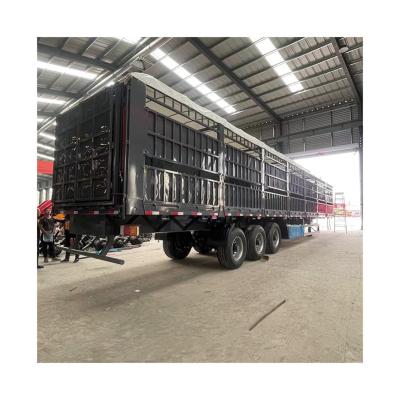 China 50 Tons High Wall Fence Truck Semi Livestock Trailer for Bulk Cargo Cattle Transport for sale