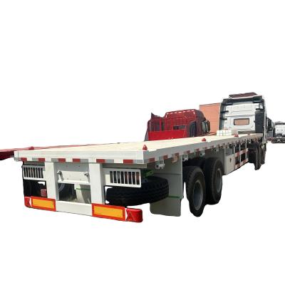 China Zambia Tri Axles 60 Tons Flatbed Semi-Trailer for 20/40 Foot FT Container Shipping for sale