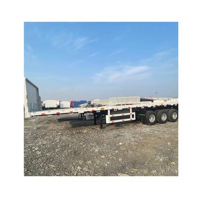 China Semi-Trailer 4 Axle 40Ft Flat Bed Flatbed Trailer with 3mm Thick Pattern Steel Plate for sale