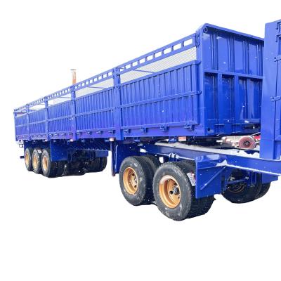 China Max Payload 30000 kg 2024 Design 3 Axle 4 Axle Side Drop Fence Truck Semi Trailer for sale