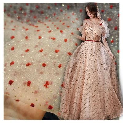 China Swiss Viable Dot Jacquard Bubble Seersucker Organza Fabric Wine Red With Gold Sparkle Design Prom Dress Fabric for sale