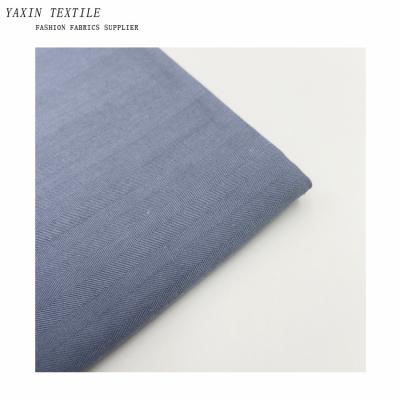 China Abrasion-Resistant Twill Stone Herringbone Cotton Tencel Wash Fabric For Shirts And Shorts for sale