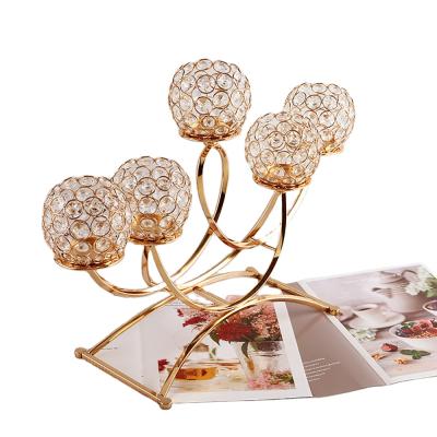 China Modern Retro 5-Head Hollowed Out Crystal Candlestick Creative Metal Plated Pearl Octagonal Candle Holder Romantic Home Furniture for sale