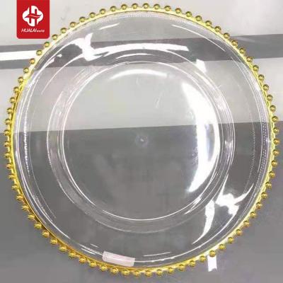 China Viable Transparent Clear Plastic Custom Round Beaded Gold Rim Charger Dishes For Wedding Decoration And Banquet Decoration for sale