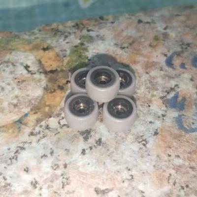 China Young Black White Handmade Double Durometer Fingerboard Wheels for sale