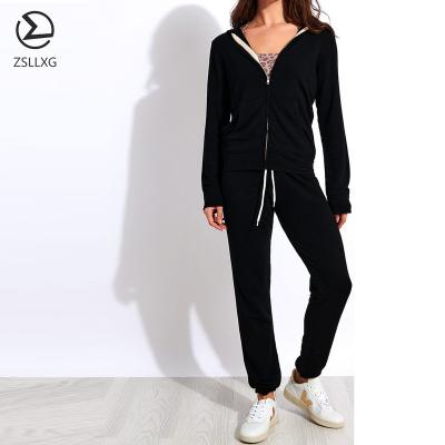 China QUICK DRY Custom Made Polyester Women Tracksuit Workout Fitness Women Sports Sets Hoodies And Zipper Tracker for sale