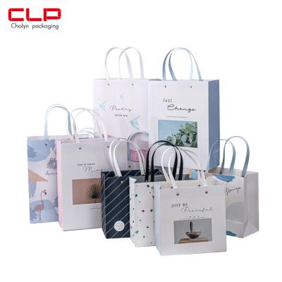 China Advanced Custom Wholesale Cardboard Art Paper Special Paper Coated Paper Packaging Bags Recyclable With Custom Logo For Gifts for sale