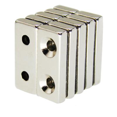 China Industrial Magnet N35 N45 N52 Rectangles Neodymium Magnet With Countersunk Hole On Both Sides for sale