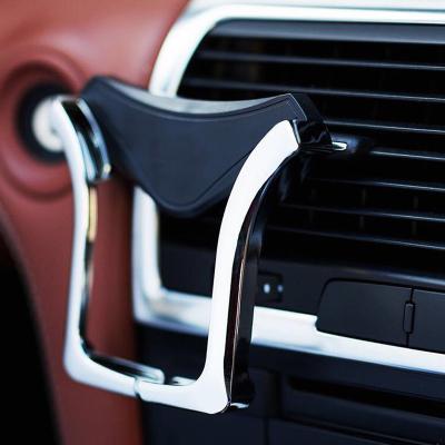 China 360 Degree Rotating New Design 360 Degree Rotating Car Mount Air Vent Mobile Phone Gravity Holder For Smart Phone for sale