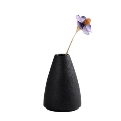 China Modern simple modern simple living room, flower ware, office, ceramic, decoration, black creative home crafts for sale