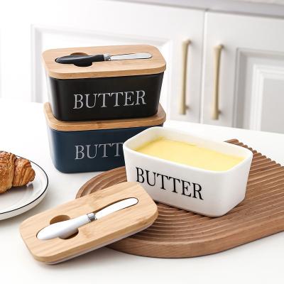 China 2022 Freshness Preservation Custom New Nordic Style Butter Dish Porcelain Ceramic Butter Box With Lid And Bamboo Knife for sale