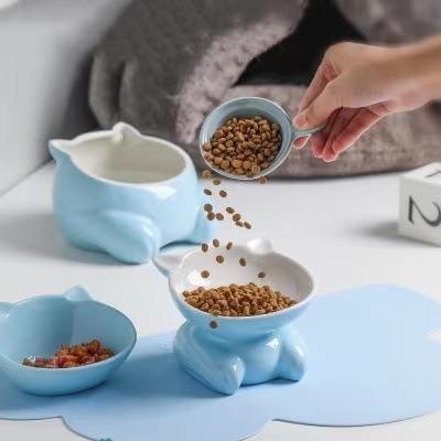 China Automatic Wholesale Custom Raised Water Ceramic Bowl Creative Pet Shape Animal Food Bowl Set With Stand for sale