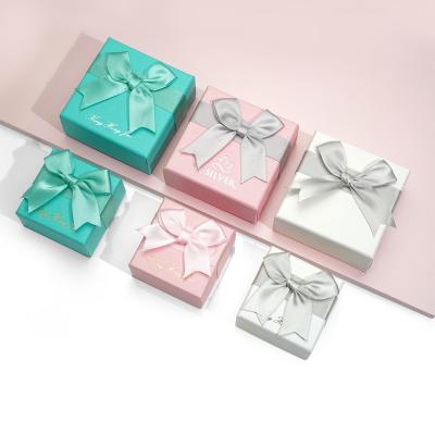 China High Grade Handmade Sliver Bow Jewelry Set Custom Earrings Ring Pendant Jewelry Packaging Box With Logo for sale