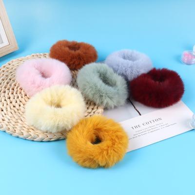 China Decorate Colorful Soft Plush Pom Pom Scrunchies Elastic Faux Fur Winter Scrunchies For Women Hair Accessories for sale