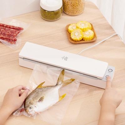 China New Xiaomi Xiaoda household vacuum sealing machine 220V household food vacuum sealing machine automatic food sealing storage for sale