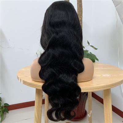 China Natural Body Wave Women Hair 4x4 Lace Wig Virgin Hair Wigs for sale