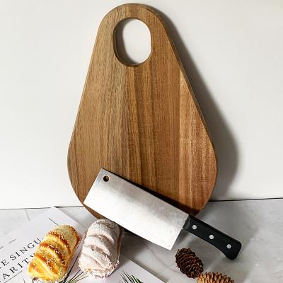 China Viable hot sale manufacturing factory design creative acacia wood chopper bread cutting board with handle for sale