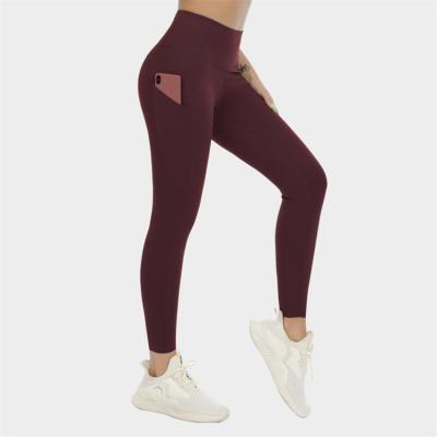 China Breathable Hot Selling High Waist Workout Tummy Control Butt Lift Up Leggings With Pockets for sale