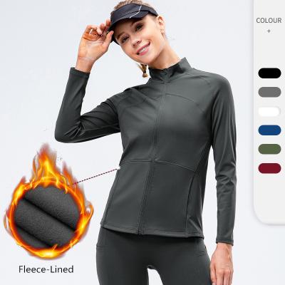 China Breathable Fleece Lined Yoga Running Long Sleeve Gym Workout Women Sports Sports With Pocket for sale