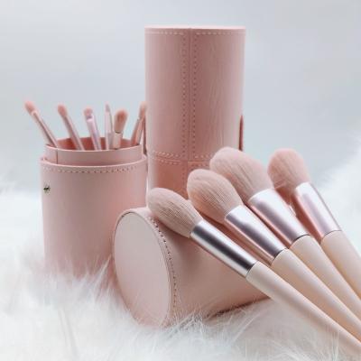 China Angular Blush Base 11pcs Wholesale Synthetic Eyeshadow Makeup Brushes Set Cute Makeup Brush With Stand for sale