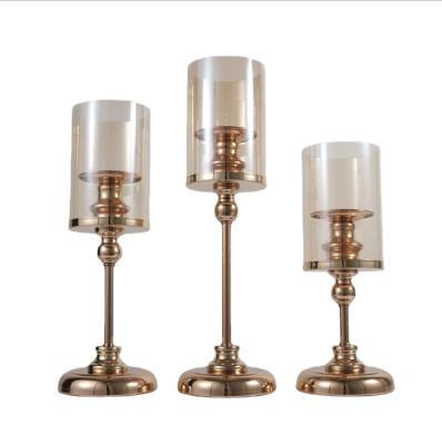 China Reusable gold stemmed candle holder set with gold glass tube for event wedding table candelabra for sale