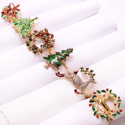 China Viable Christmas Gold Snow Star Tree Reindeer Napkin Napkin Ring Colors Napkin Rings For Christmas Table Top Decoration SWN314 for sale