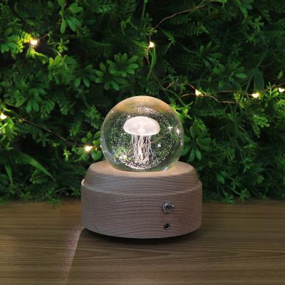 China Modern kc Certified Jellyfish Crystal Ball Music Box Led Night Base Reachargeable Decoration Kids Bedroom Wooden Light for sale