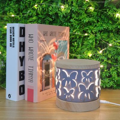 China Modern Zhongshan Style White Butterfly Wood Base Table Lamp USB Led Mood Lamp Night Light For Bedroom for sale