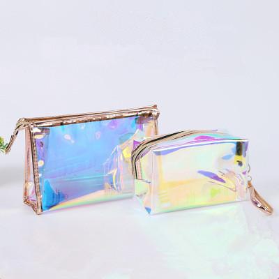 China Private Label Logo Laser TPU Waterproof Magic Cosmetic Transparent Storage Women's Waterproof Travel Handbags for sale