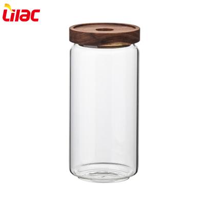 China Different Size 290ml 450ml 700ml 1200ml Lilac Sufficient Stock Borosilicate Glass Storage Jar With Wooden Lid for sale